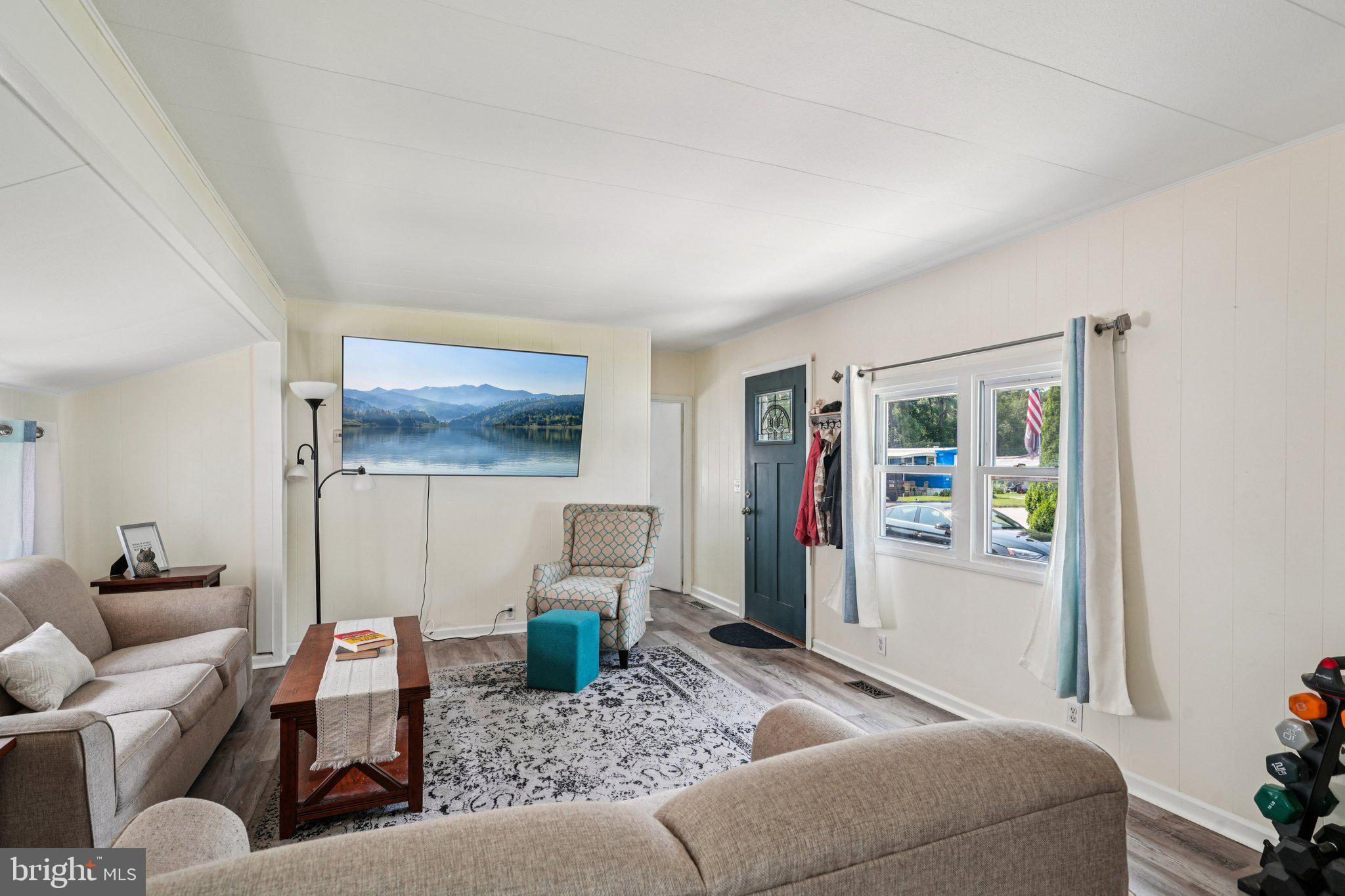 2528 Tilton Road, Unit 421 Egg Harbor Township, NJ 08234 - Photo 9 of 31 a living room with furniture and a window