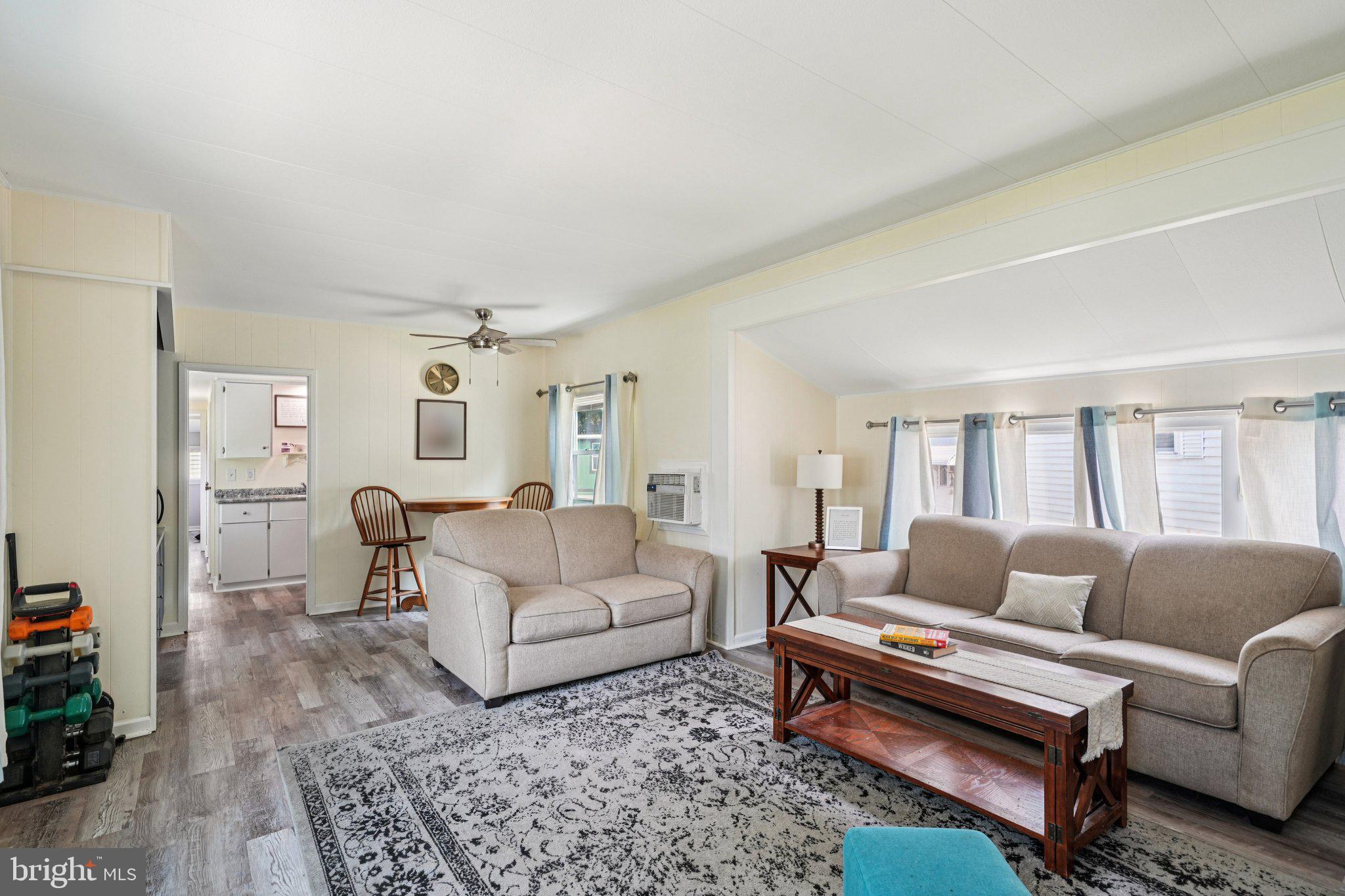 2528 Tilton Road, Unit 421 Egg Harbor Township, NJ 08234 - Photo 10 of 31 a living room with furniture and a couch