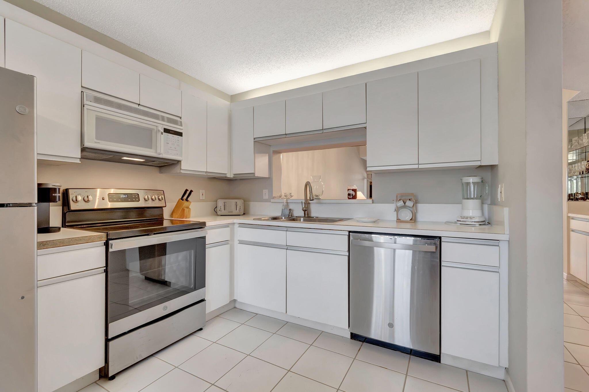 280 Northwest 67th Street, Unit B207 Boca Raton, FL 33487 - Photo 3 of 25 52-web-or-mls-DSC_0497