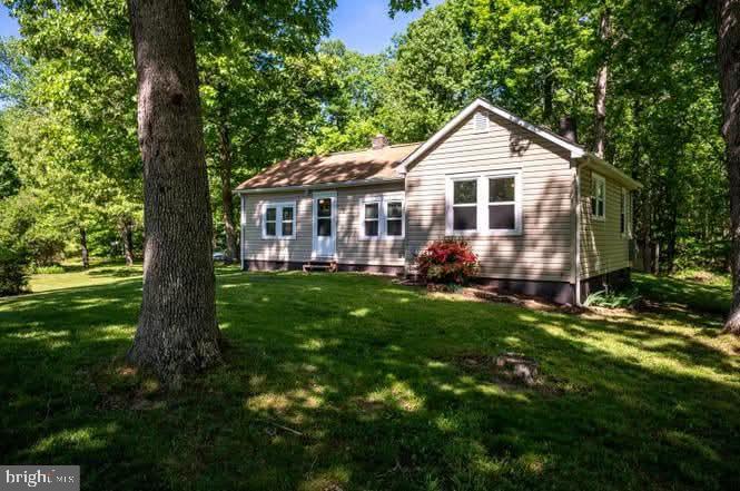 17400 Hudson Road Culpeper, VA 22701 - Photo 2 of 7 Charming home nestled in lush greenery.