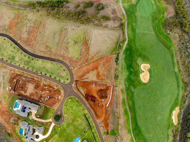 a view of a lake with a yard