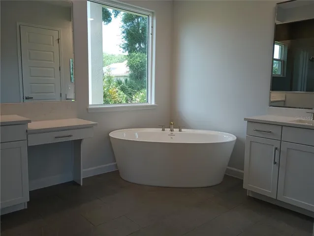 $900,000 | 136 New Leatherwood Drive, Palm Coast, FL 32137