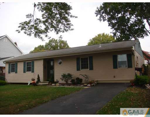 14 Purdue Road Old Bridge, NJ 08859 - Photo 1 of 9 a front view of a house with a garden