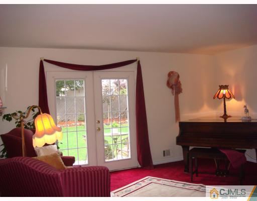 14 Purdue Road Old Bridge, NJ 08859 - Photo 3 of 9 a view of a livingroom with furniture and window