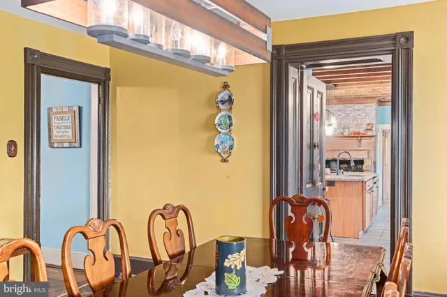 a work room with furniture and windows