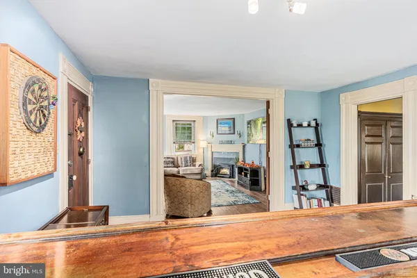 a living room with furniture and a table