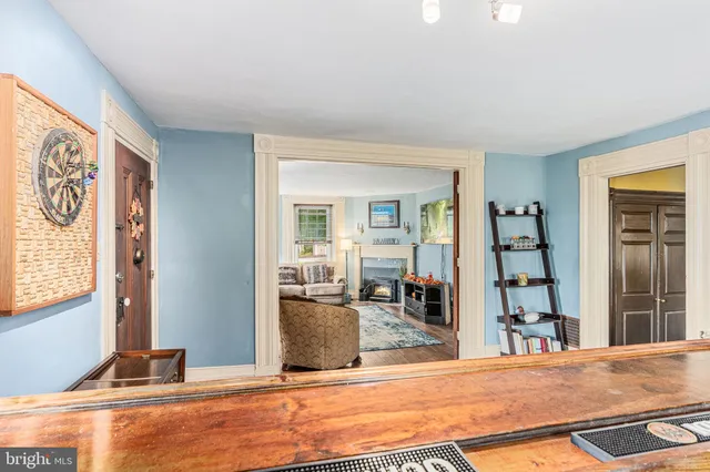 a living room with furniture and a table
