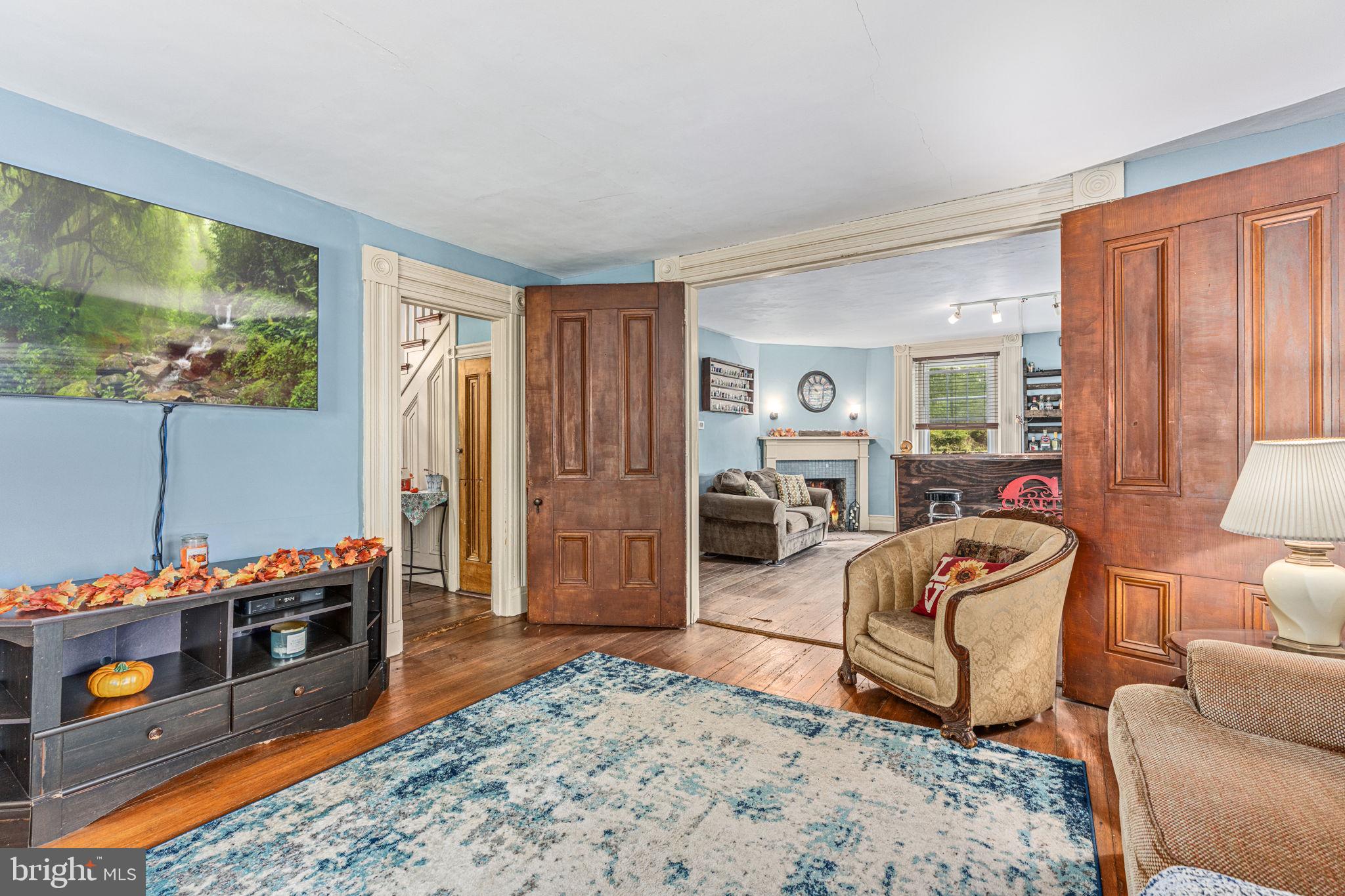 4701 Edges Mill Road Downingtown, PA 19335 - Photo 31 of 74 a bedroom with furniture and a flat screen tv