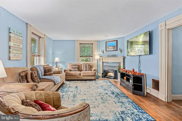 a bedroom with a bed furniture and a window