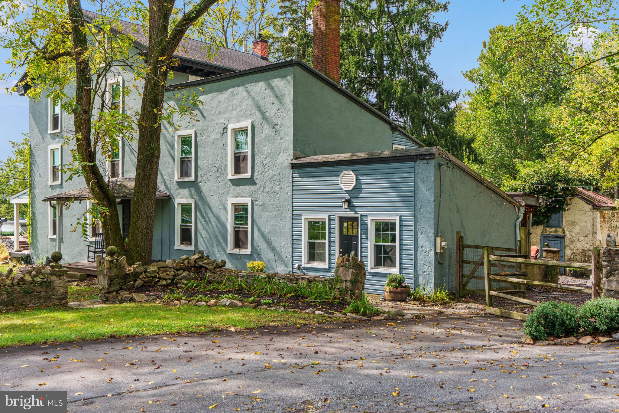 4701 Edges Mill Road Downingtown, PA 19335 - Photo 57 of 74 a front view of a house with garden