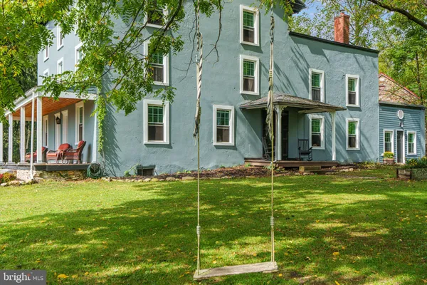 a kitchen with sink and refrigerator