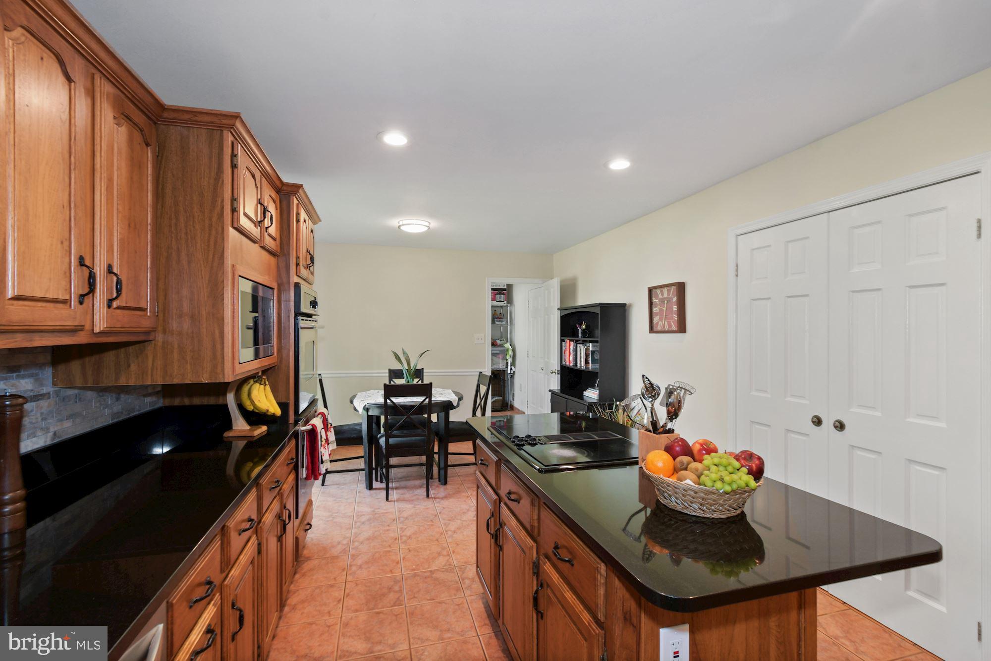 8320 Riverside Road Alexandria, VA 22308 - Photo 8 of 43 Laundry room and garage access off of kitchen