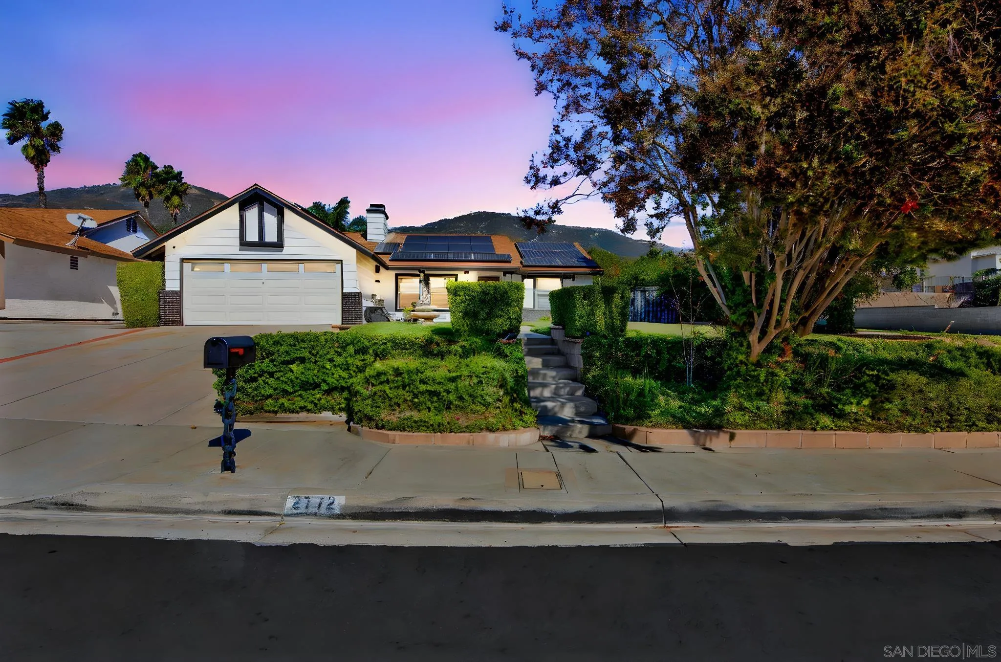 2772 Cincinnati Street West San Bernardino, CA 92407 - Photo 1 of 41 a front view of a house with a yard and garage