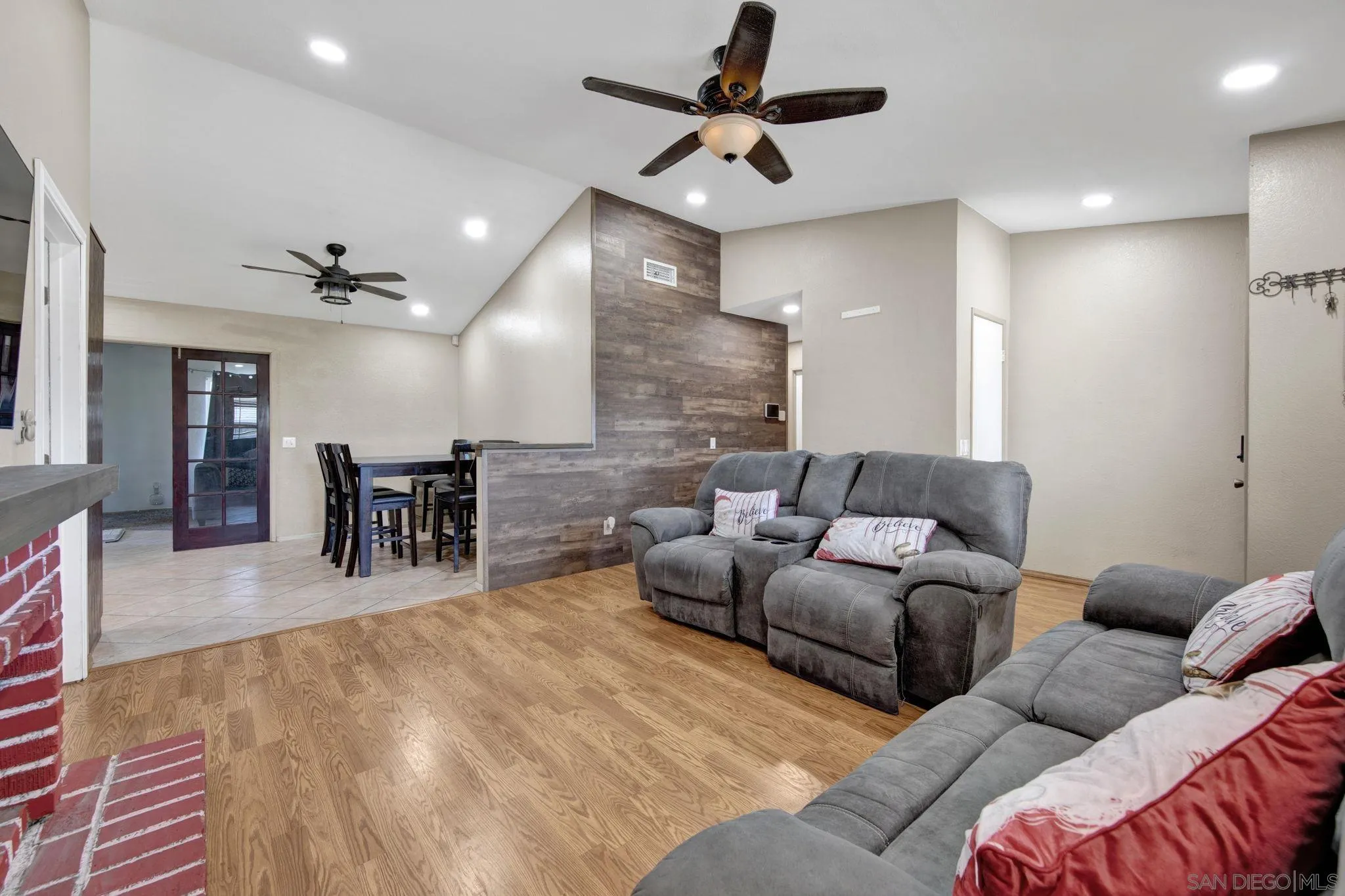 2772 Cincinnati Street West San Bernardino, CA 92407 - Photo 6 of 41 a living room with furniture and a view of kitchen