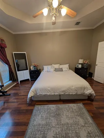 a room with gym equipment and a projector