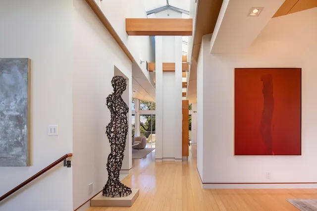 a view of a hallway with windows