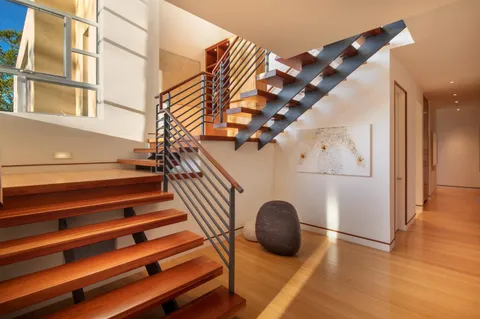 a view of entryway with wooden floor
