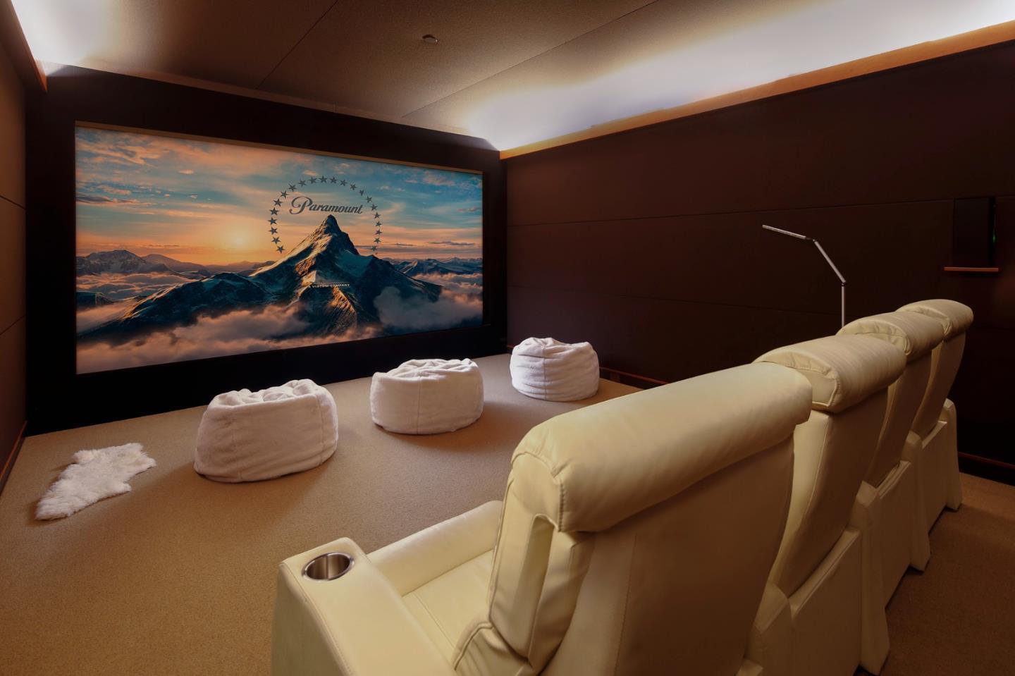 1 Grove Court Portola Valley, CA 94028 - Photo 22 of 43 a living room with furniture and a flat screen tv