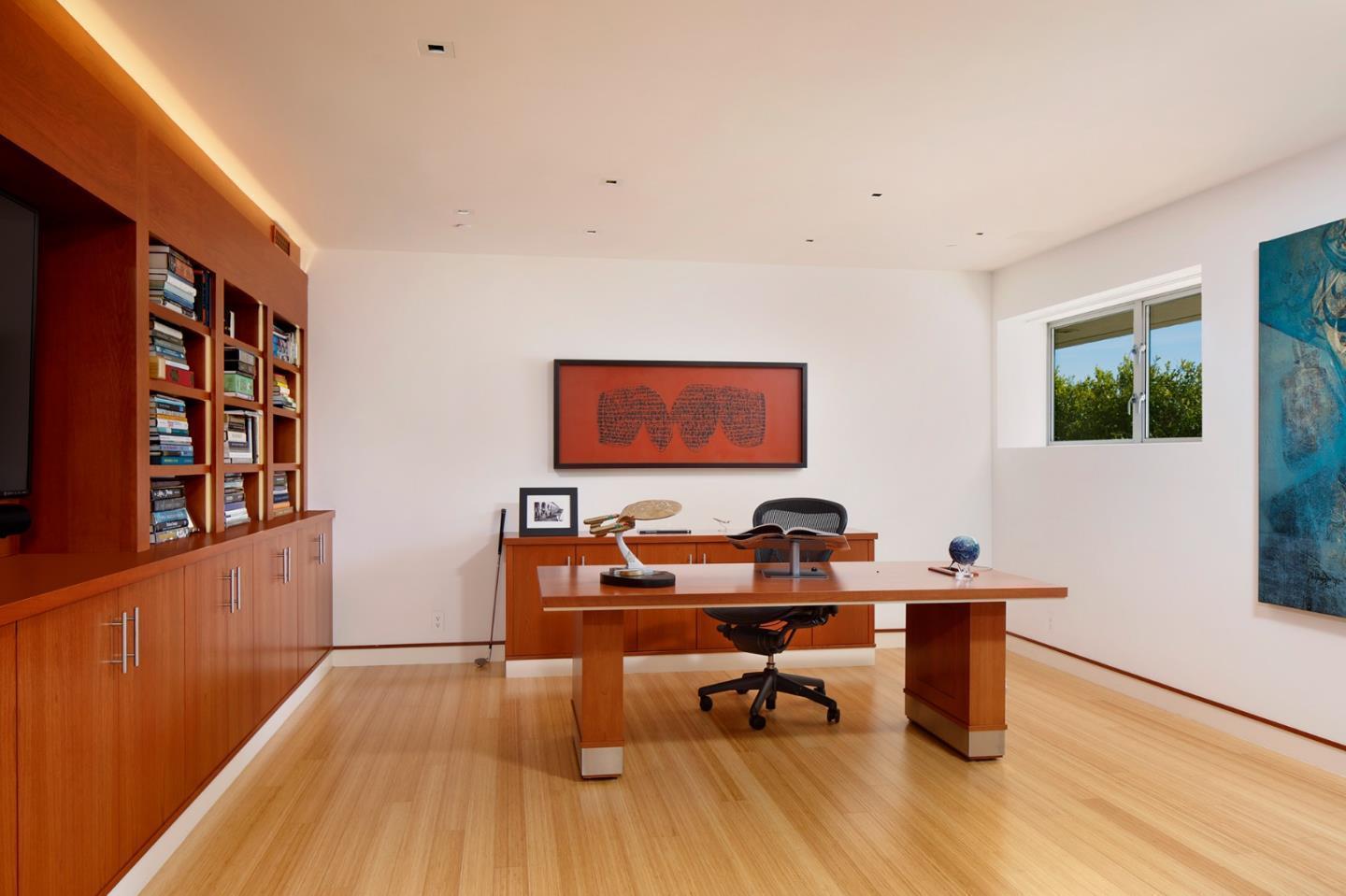 1 Grove Court Portola Valley, CA 94028 - Photo 29 of 43 a workspace with furniture and wooden floor