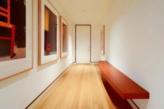 a bathroom with sink and mirror