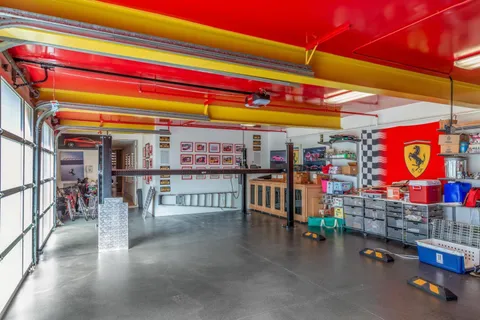 a utility room with sink dryer and washer
