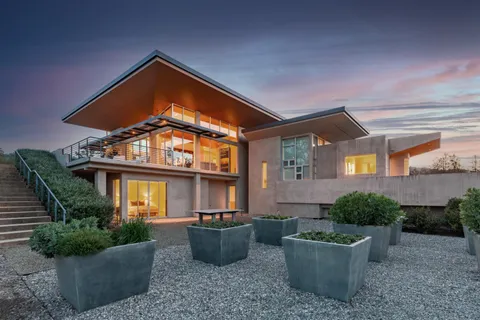 a front view of house with a yard