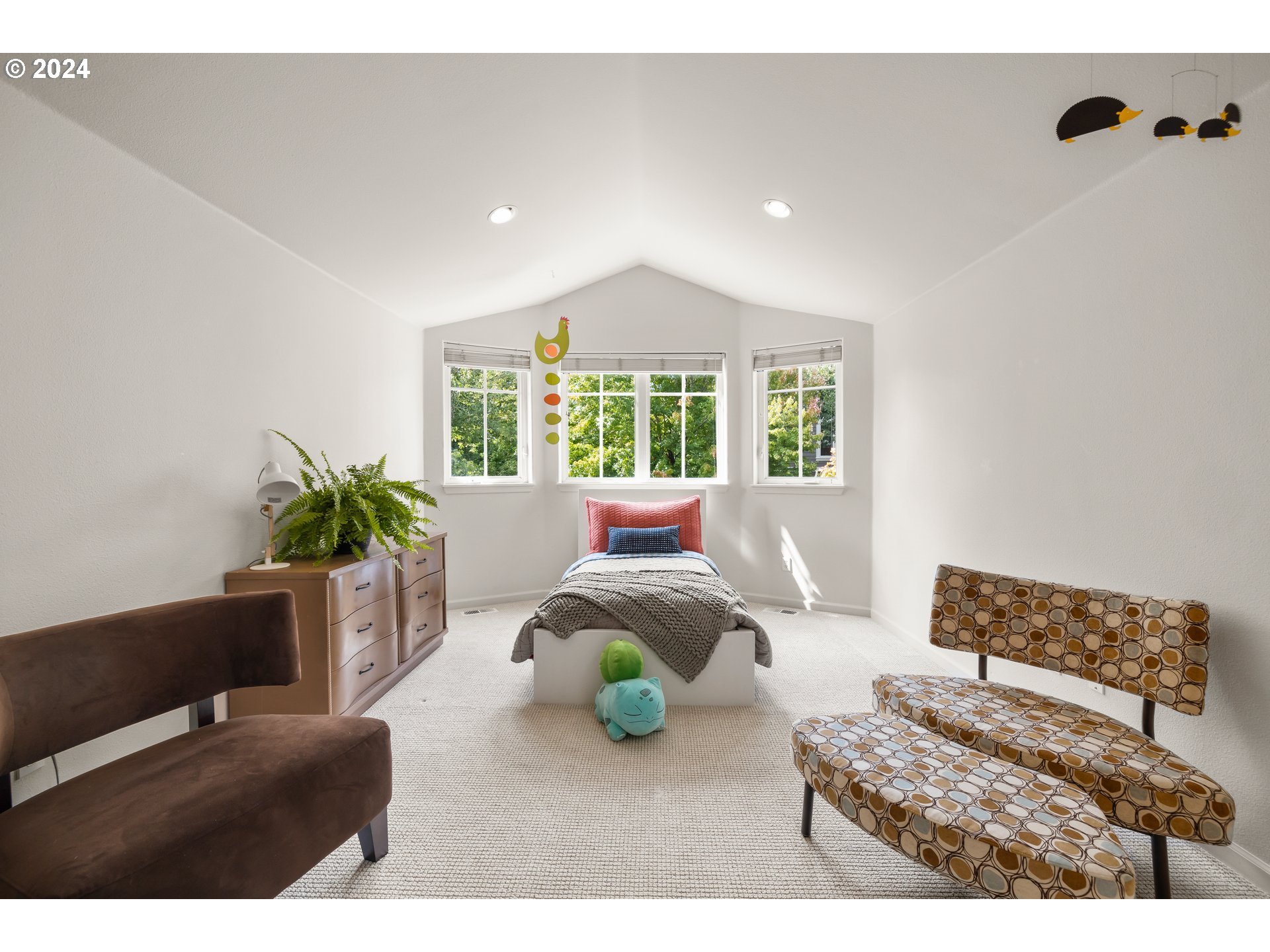 2534 Northwest Rhodes Lane Portland, OR 97229 - Photo 17 of 41 a living room with furniture and a potted plant