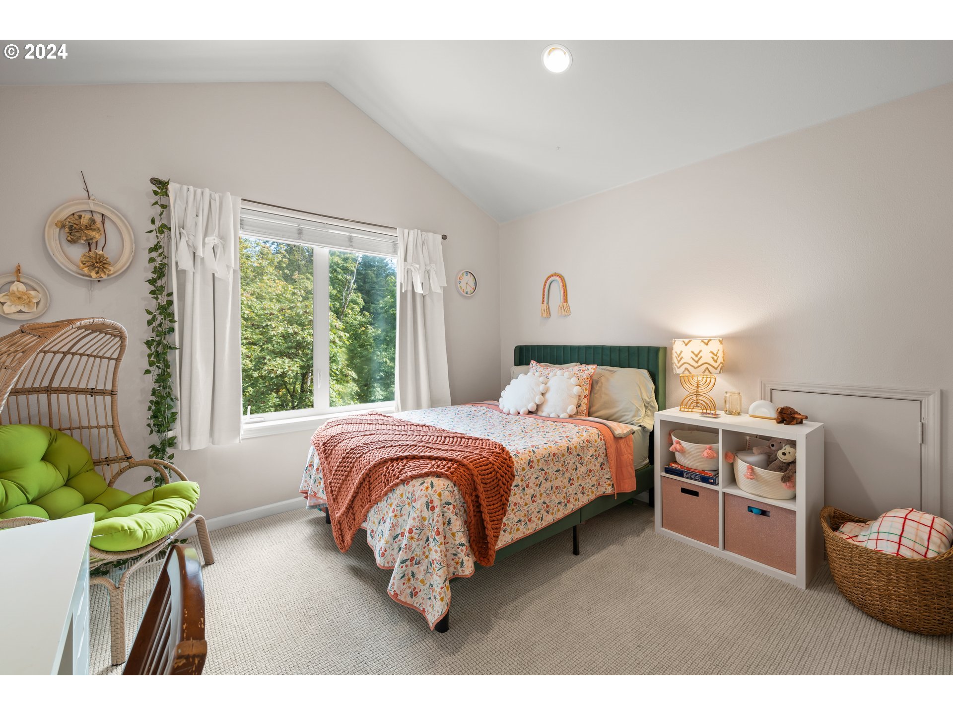 2534 Northwest Rhodes Lane Portland, OR 97229 - Photo 19 of 41 a bedroom with a bed next to a window with outer view