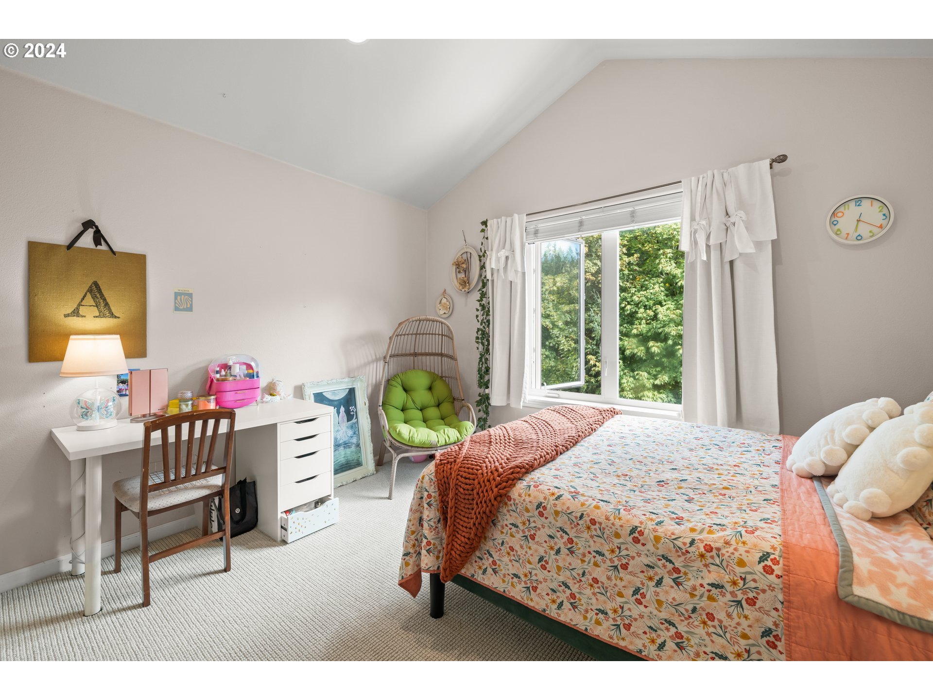 2534 Northwest Rhodes Lane Portland, OR 97229 - Photo 20 of 41 a bedroom with a bed and a window
