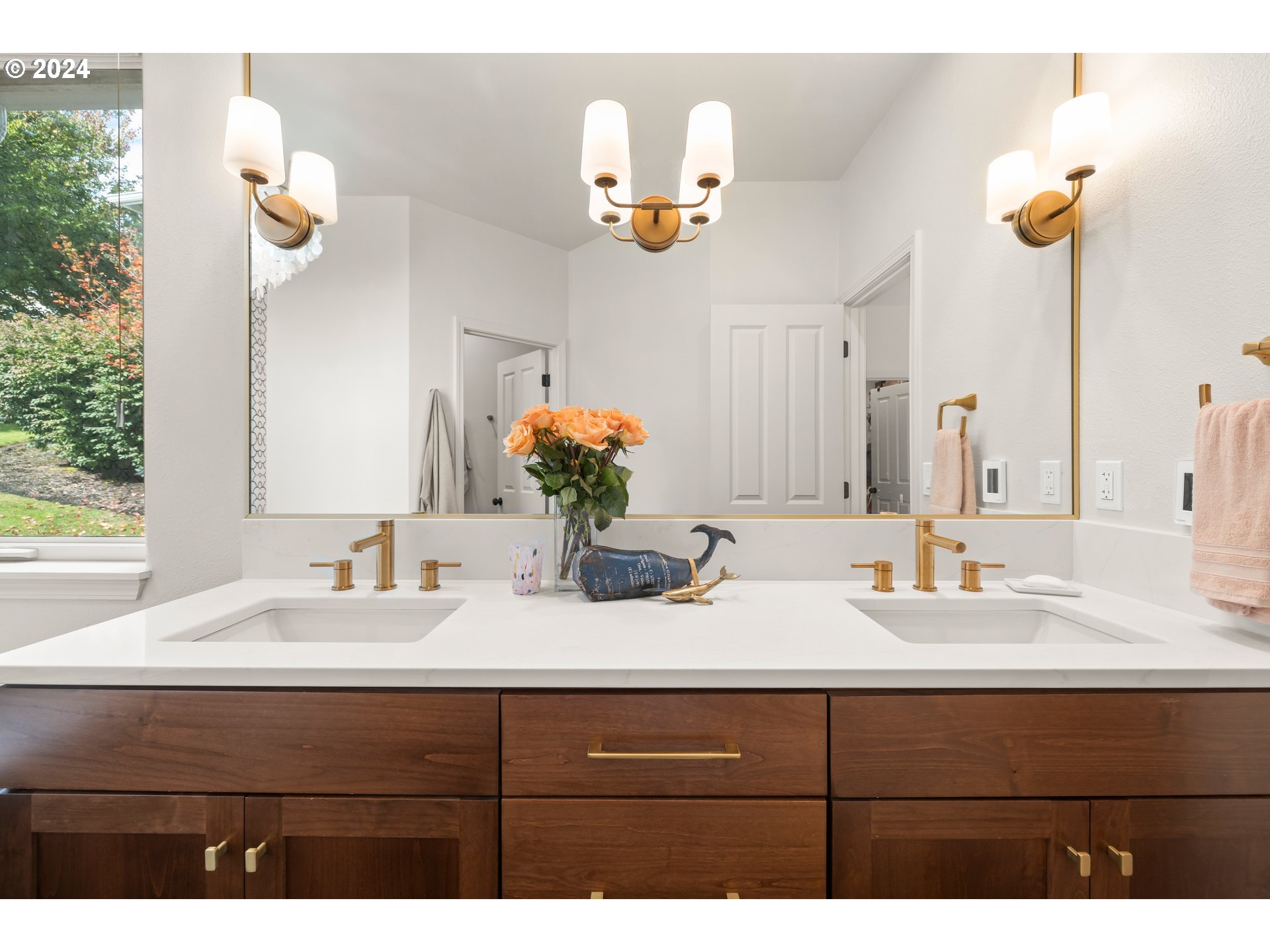 2534 Northwest Rhodes Lane Portland, OR 97229 - Photo 25 of 41 a bathroom with a sink and a mirror