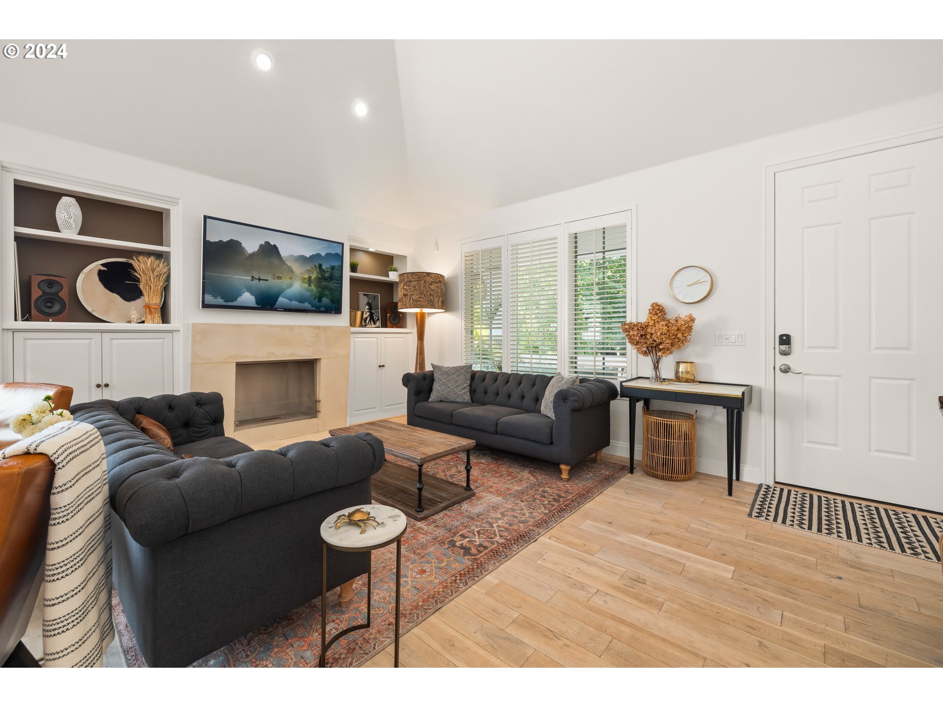 2534 Northwest Rhodes Lane Portland, OR 97229 - Photo 3 of 41 a living room with furniture and a fireplace