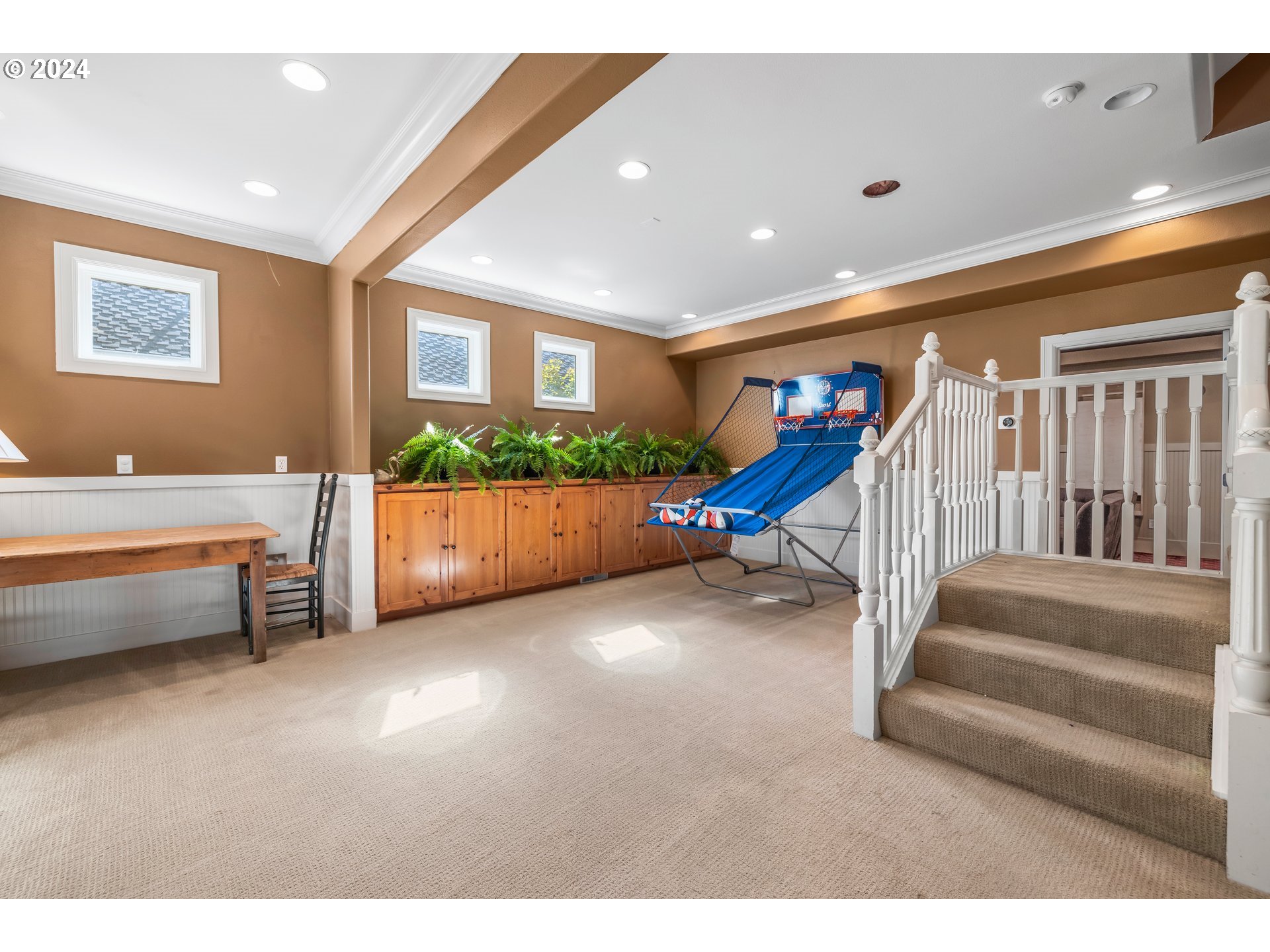 2534 Northwest Rhodes Lane Portland, OR 97229 - Photo 32 of 41 a view of livingroom with furniture and staircase