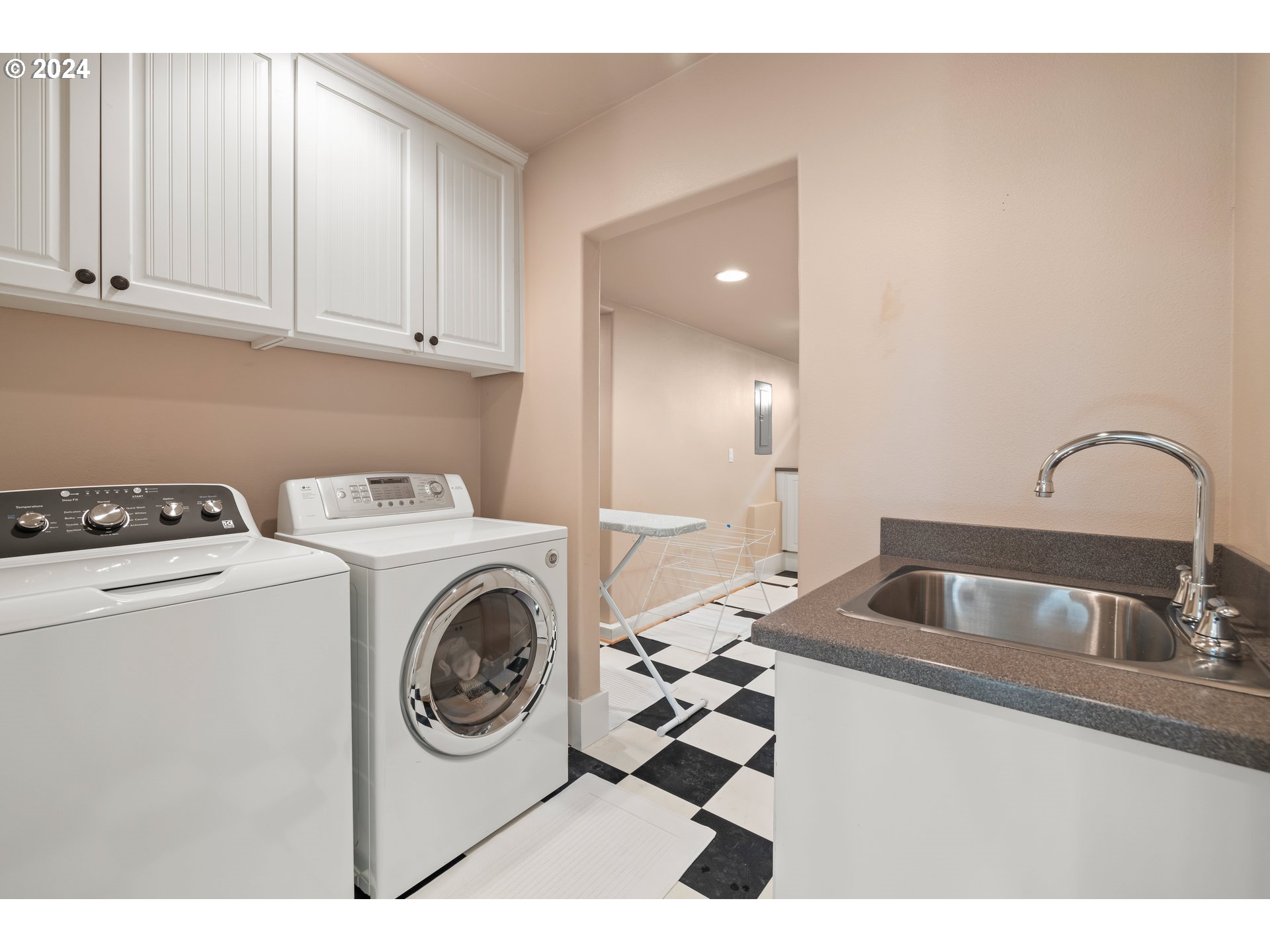 2534 Northwest Rhodes Lane Portland, OR 97229 - Photo 36 of 41 a utility room with dryer and washer