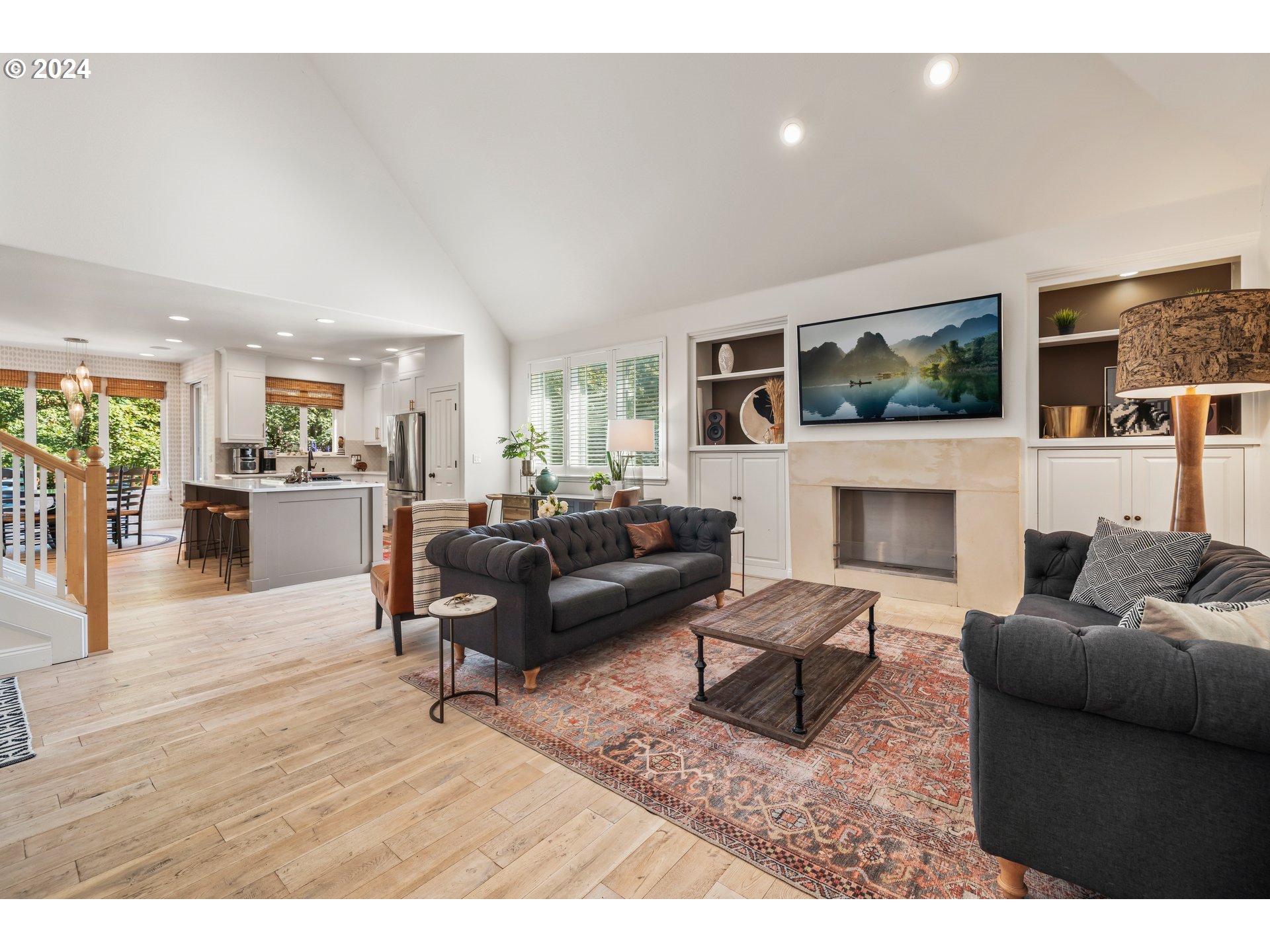 2534 Northwest Rhodes Lane Portland, OR 97229 - Photo 4 of 41 a living room with furniture and a fireplace