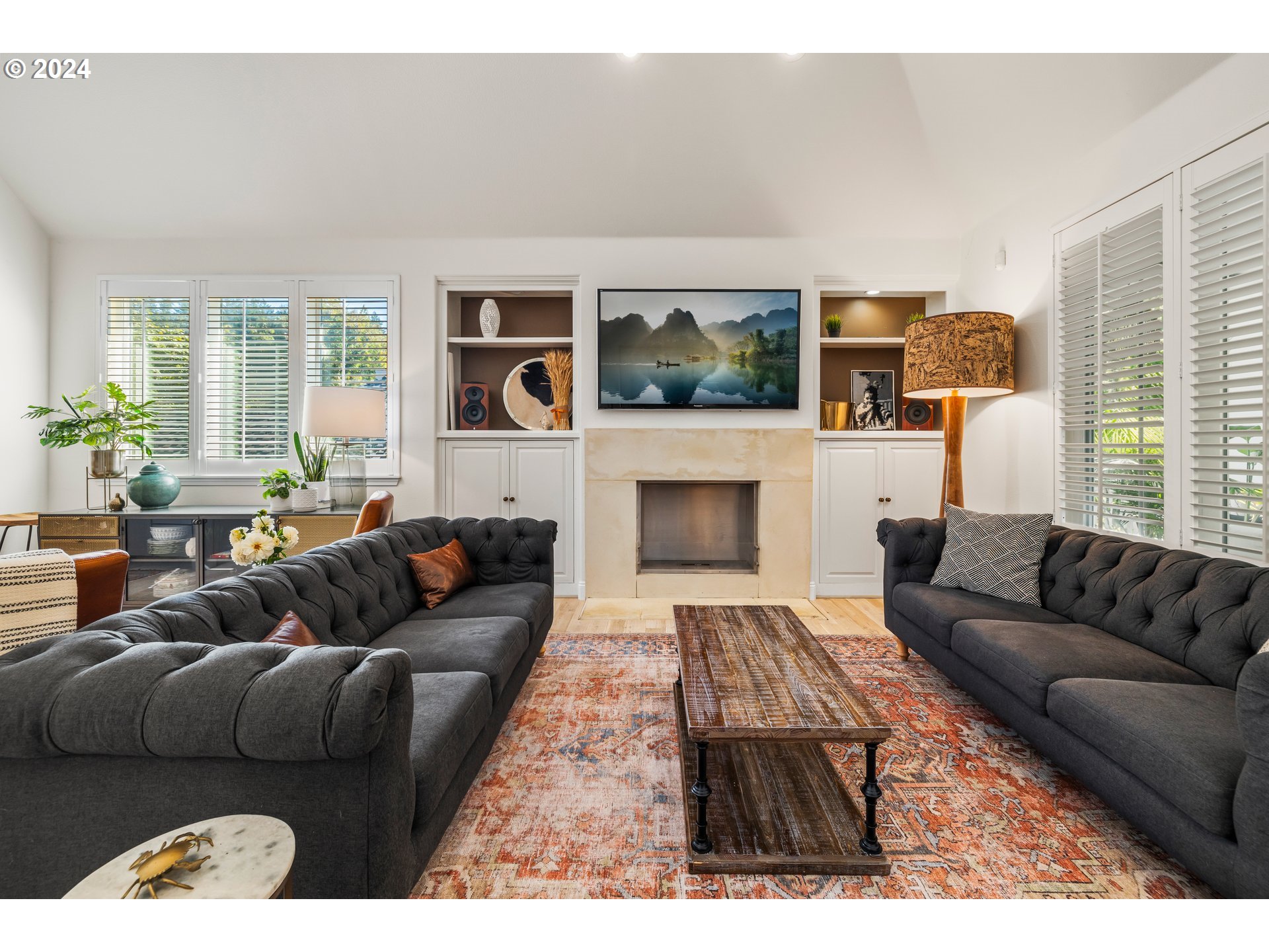 2534 Northwest Rhodes Lane Portland, OR 97229 - Photo 5 of 41 a living room with furniture and a fireplace