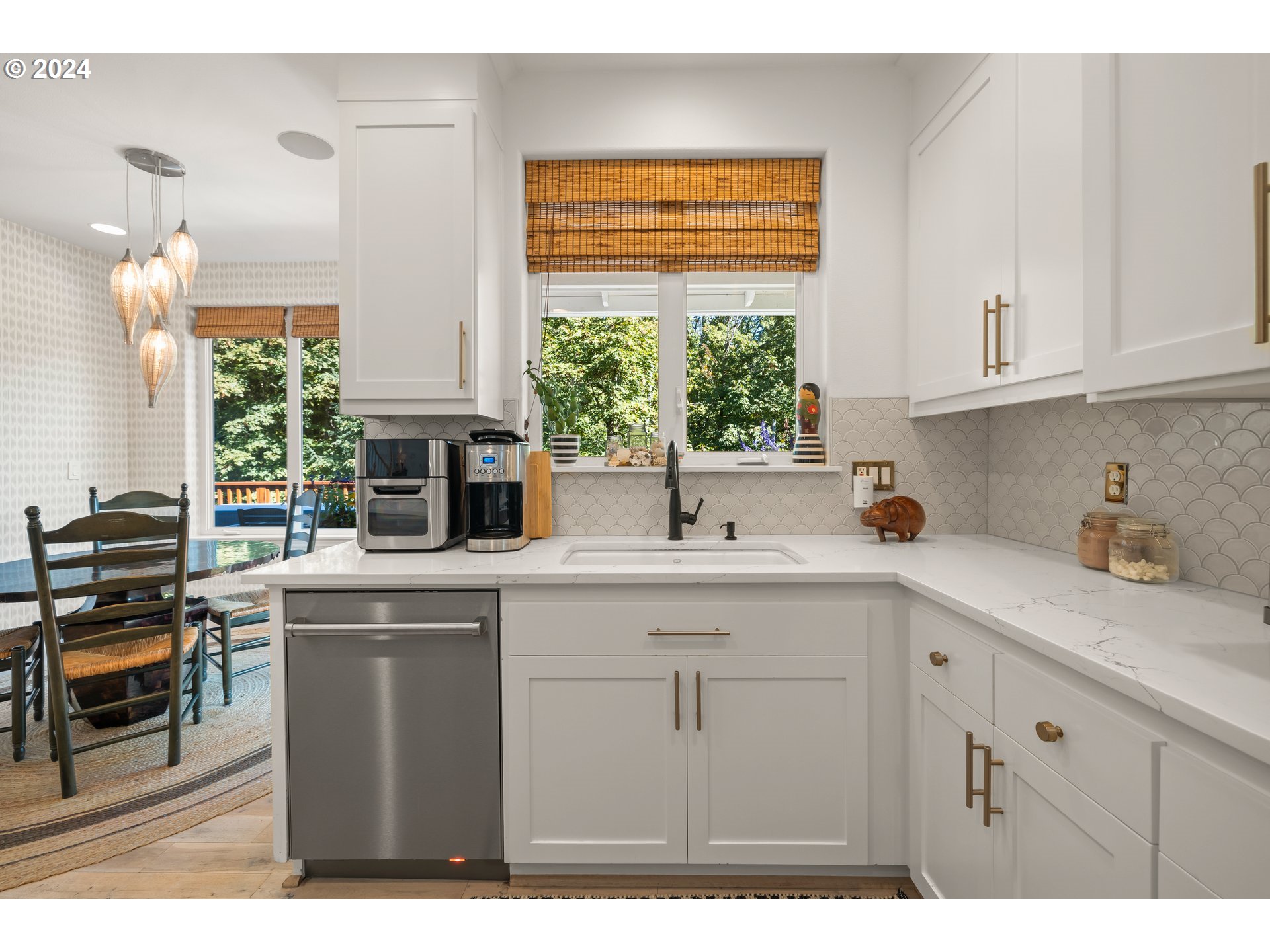 2534 Northwest Rhodes Lane Portland, OR 97229 - Photo 10 of 41 a kitchen with a sink and cabinets