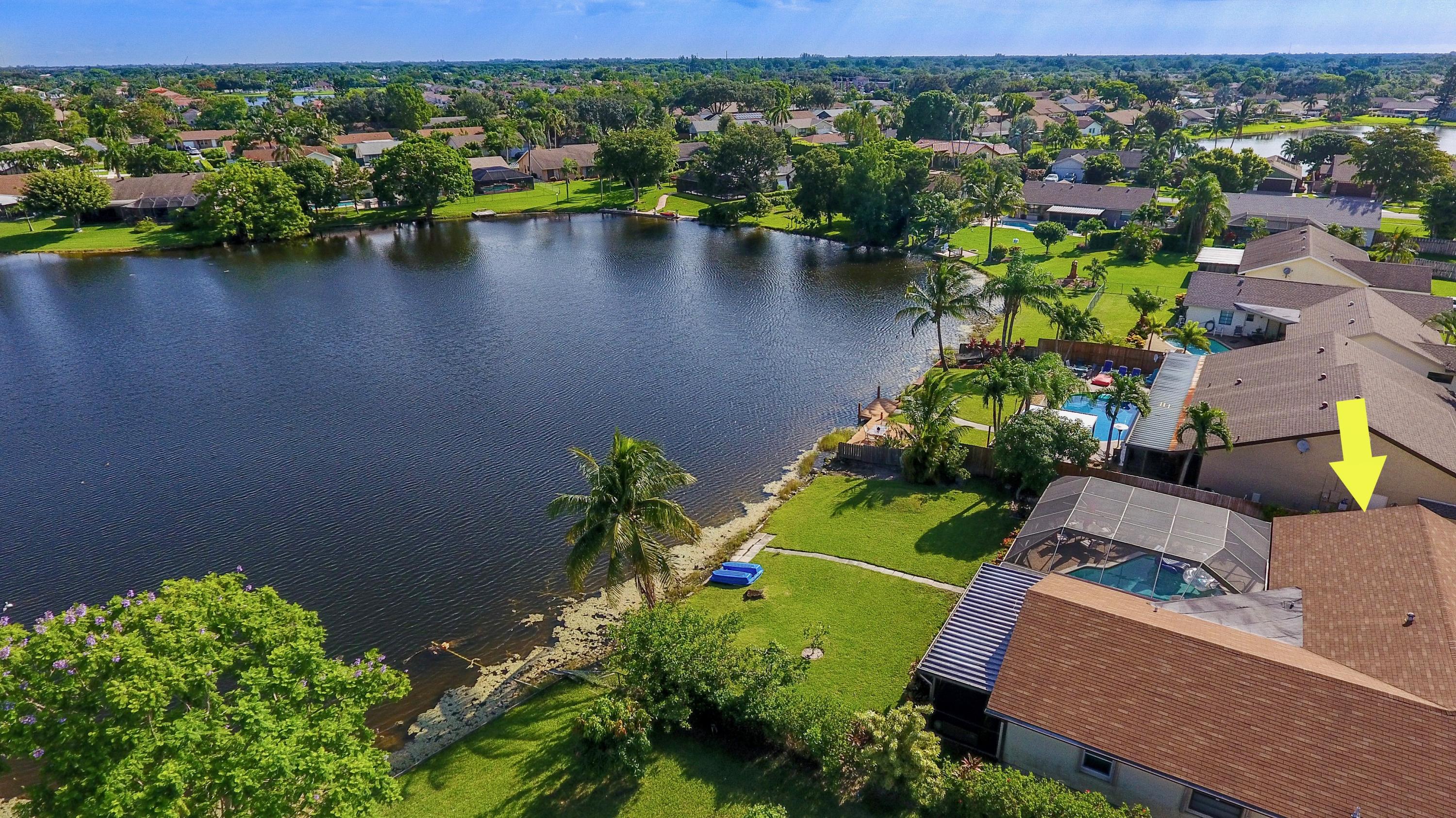 9535 Ohio Place Boca Raton, FL 33434 - Photo 12 of 16 an aerial view of a house with a lake view