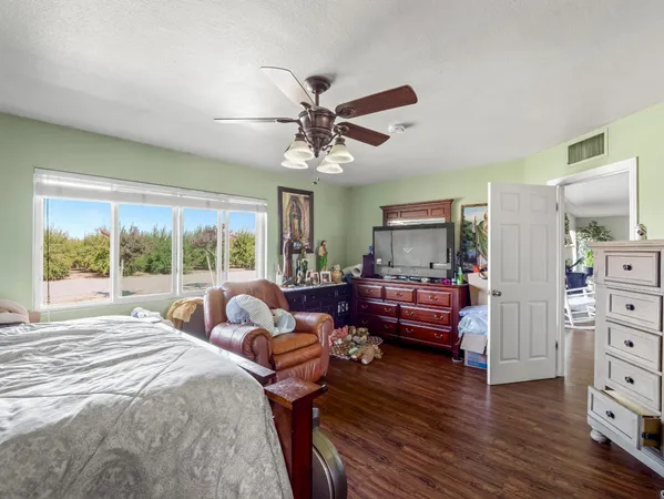 a bathroom with a sink vanity and a mirror