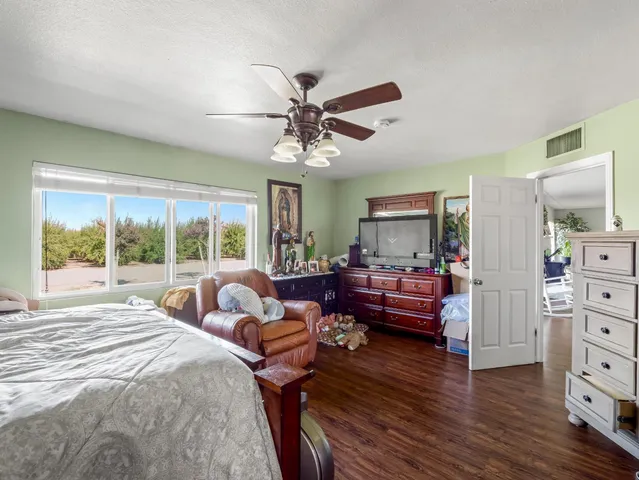 a bathroom with a sink vanity and a mirror