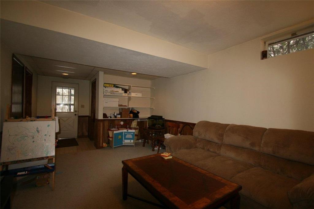 2406 Rihn Strasse Gibsonia, PA 15044 - Photo 20 of 25 Finished Game room with door to the backyard