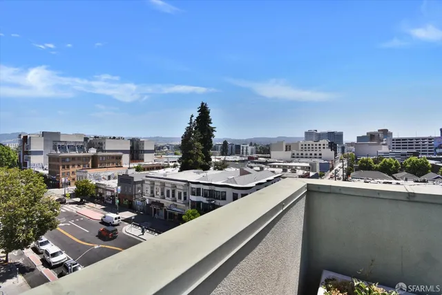 a view of a balcony with city view