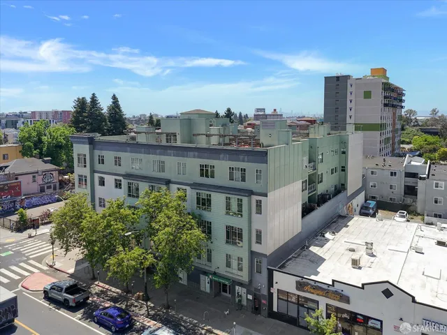 an aerial view of a house with a garden