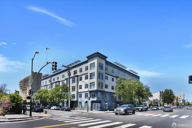 a view of a chairs and table in the backyard