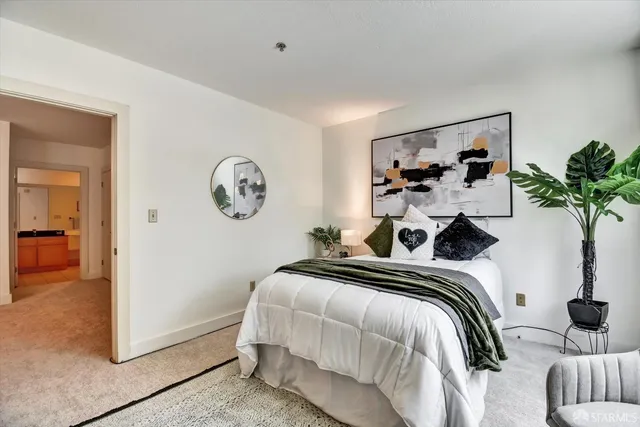 a table and chairs in a small room