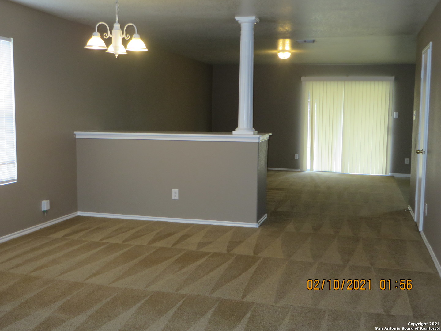 4630 Rothberger Way San Antonio, TX 78244 - Photo 4 of 13 a view of an empty room with a window