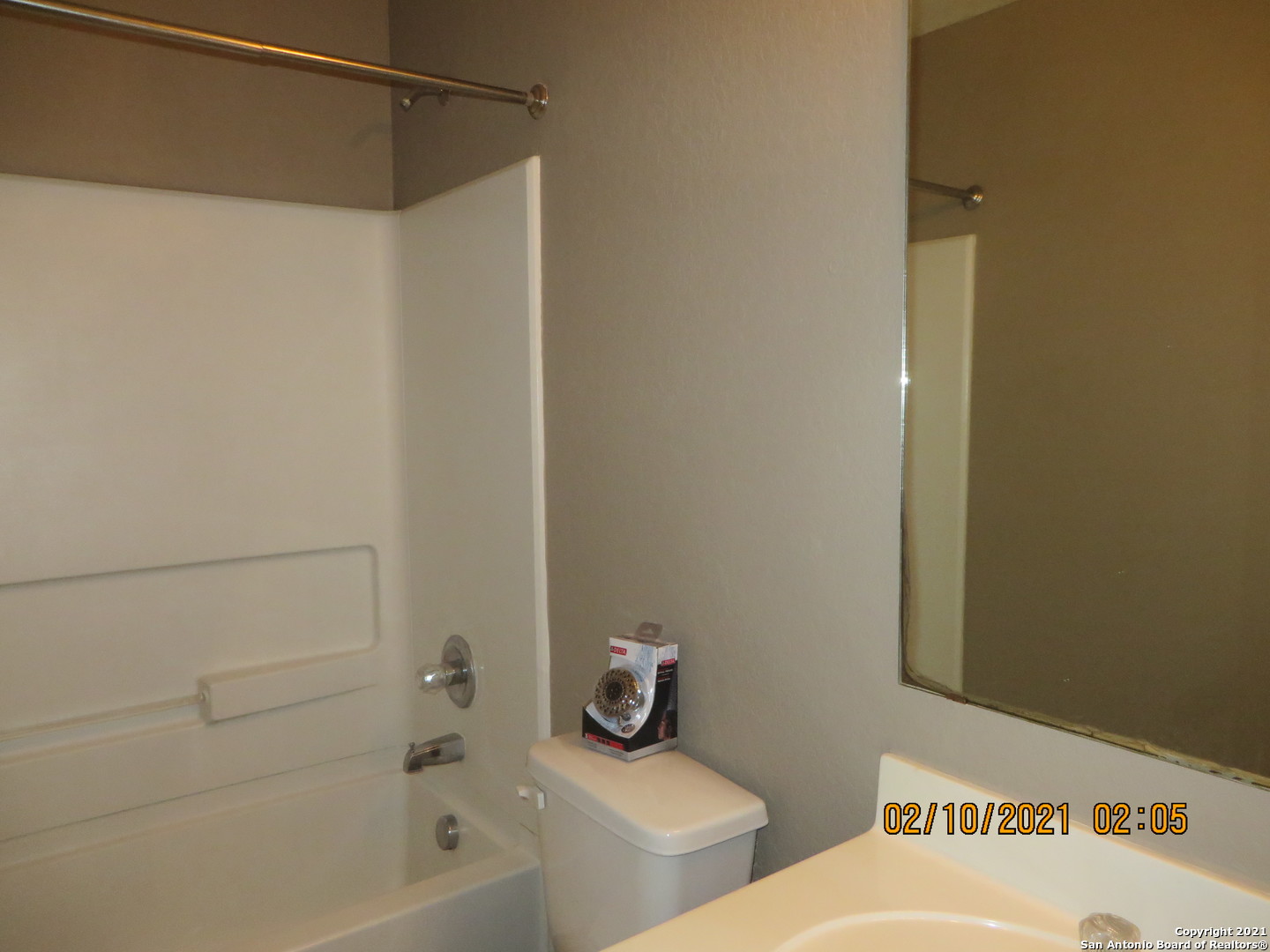 4630 Rothberger Way San Antonio, TX 78244 - Photo 9 of 13 a bathroom with a bathtub and shower