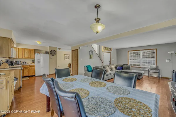 a living room with furniture and a table