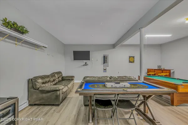 a bedroom with two beds and a window