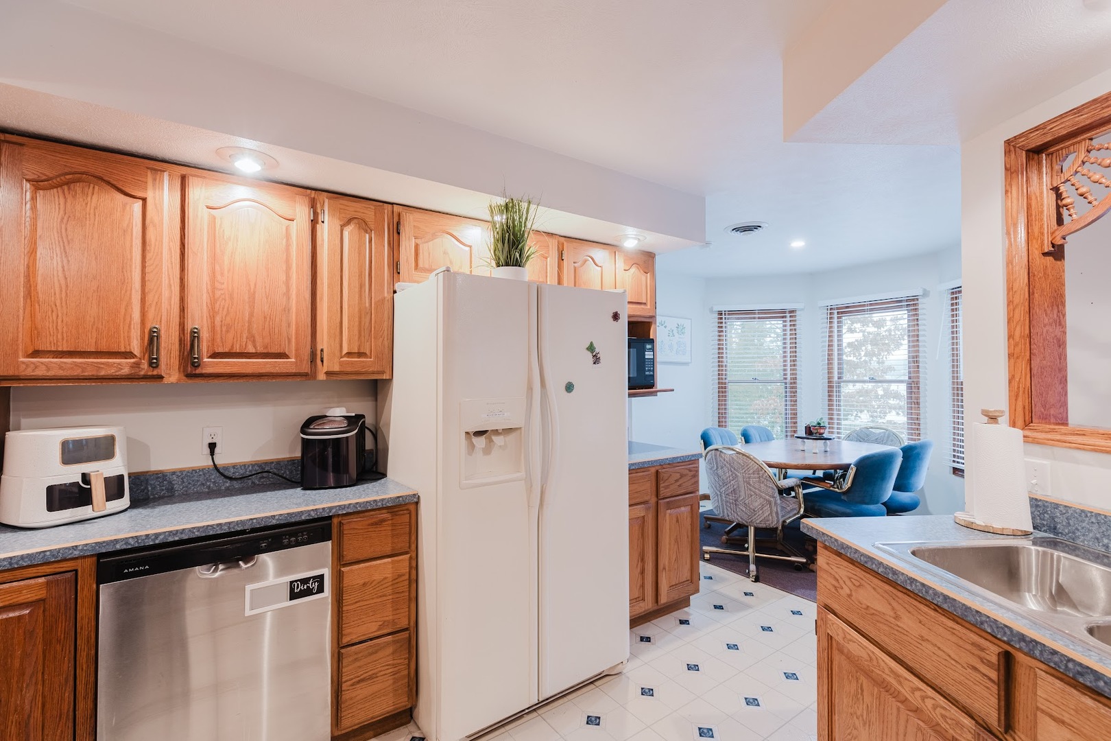 175 Oak Circle Goreville, IL 62939 - Photo 13 of 60 a kitchen with stainless steel appliances a refrigerator sink and cabinets