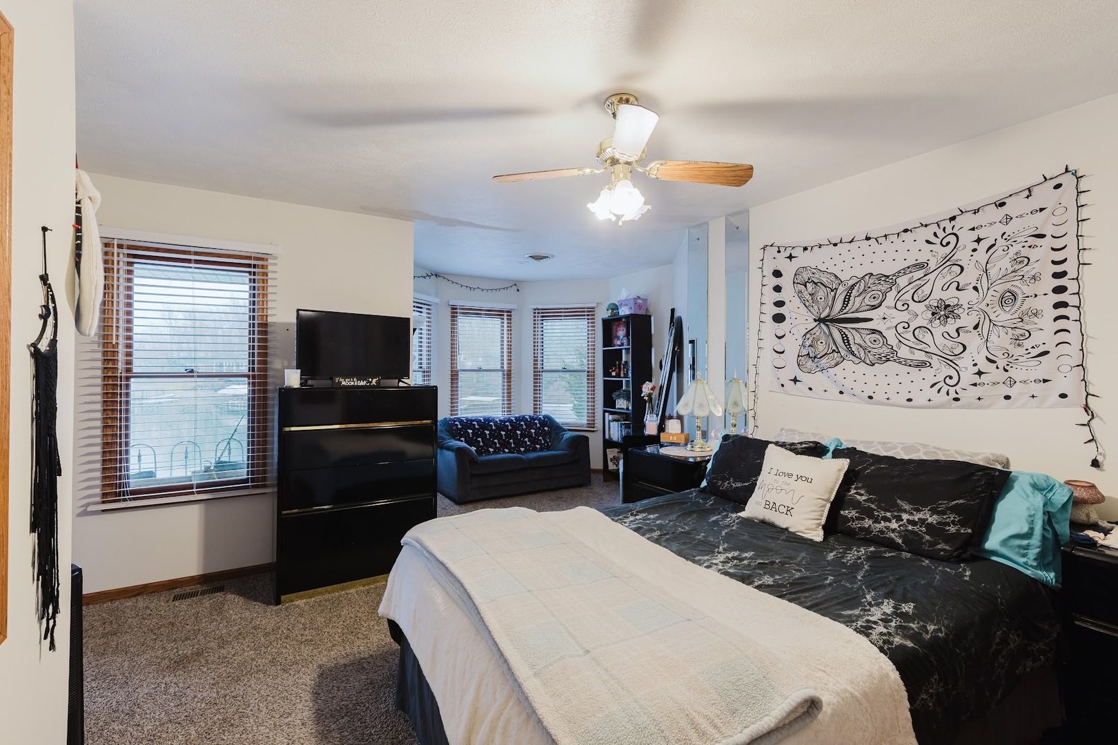 175 Oak Circle Goreville, IL 62939 - Photo 30 of 60 a bedroom with a bed and wooden floor